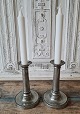 Pair of 
beautiful 1800s 
tin 
candlesticks 
with pearl edge 
- loose cuffs. 
With owner's 
initials: ...