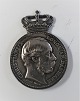 Silver (925). 
Royal bookmark 
mounted with 
the reverse of 
the 
commemorative 
medal. The 
fabric is ...