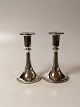A pair of silver candlesticks of 830s
