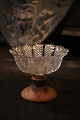 Old Swedish 
1800 century 
bowl in pressed 
glass 
mounted with 
wooden foot. 
H:10cm. 
Dia.:12cm.
