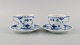 Two Royal Copenhagen Blue Fluted Half Lace coffee cups with saucers. Model 
number 1/756.
