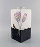 Fabienne 
Jouvin, Paris. 
Unique vase in 
glazed ceramics 
with 
hand-painted 
flowers and 
butterfly. ...