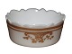 Royal 
Copenhagen Gold 
Basket with 
Ornaments and 
Small Flowers, 
small round 
salt jar.
This ...