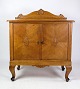 Small oak sideboard with 2 doors and carvings from around the 1930s.Dimensions in cm: H99 W: ...