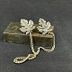 Length 2.5 cm.The chain measures 20 cm.A pair of fine old cheese buttons in silver plate ...