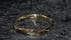 Elegant 
Bracelet in 14 
carat gold 
engravings
Stamped 585 
GIFA
Width 59.08 * 
54.76 mm
Height ...