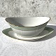 Royal 
Copenhagen, 
Green curved, 
Sauce bowl # 
925/1651, 23cm 
wide, 9.5cm 
deep, 1st grade 
* ...