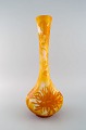 Antique and 
rare Emile 
Gallé vase in 
white and 
yellow / orange 
art glass 
carved in the 
form of ...