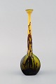 Rare antique 
Emile Gallé 
vase in yellow 
and dark art 
glass carved in 
the form of 
branches with 
...