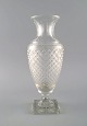 Baccarat, 
France. Art 
deco vase in 
clear crystal 
glass. 1930s.
Measures: 28 x 
11 cm.
In ...