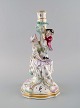 Antique Meissen candlestick in hand-painted porcelain. Mother and boy with 
flowers. Late 19th century.
