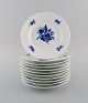 11 Royal Copenhagen Blue Flower Braided plates. Model number 10/8094. Mid-20th 
century.
