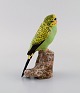 Jeanne Grut for Royal Copenhagen. Figure in hand-painted and glazed faience. 
Budgerigar. 1970s.
