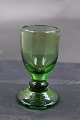 Green liqueur glass cutted under foot from about Year 1900 from Holmegaard, Denmark. In a good ...