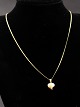 14 carat gold 
neck lace 48 
cm. and heart 
pendant 1 x 1.2 
cm. item No. 
495423