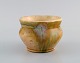 European studio ceramicist. Unique vase in glazed ceramics. Beautiful glaze in 
sand shades. Mid-20th century.
