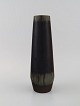 Carl Harry 
Stålhane 
(1920-1990) for 
Rörstrand. Vase 
in glazed 
ceramics with 
vertically 
incised ...