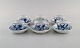 Six Meissen Blue Onion coffee cups with saucers in hand-painted porcelain. Early 
20th century.
