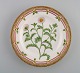 Royal Copenhagen Flora Danica lunch plate in hand-painted porcelain with flowers 
and gold decoration. Model number 20/3550.
