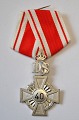 The Danish Scout Corps 40 year medal with order ribbon, 20th century 4.8 x 3.2 cm.