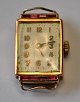 Ladies 
wristwatch in 
gold box, deco, 
with rubies, 
Switzerland. 
With the 
number: 6855. 
Box ...