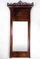 Mirror of 
hand-polished 
mahogany, from 
the late Empire 
period with 
carvings made 
in Denmark from 
...