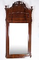 Mirror of hand-polished mahogany, with carvings, made in Denmark from around the ...