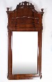 Mirror of 
hand-polished 
mahogany, with 
carvings, made 
in Denmark from 
around the ...