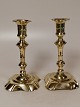 A pair of 
stamped brass 
baroque 
candlesticks 
both double 
stamped Height 
18.5cmA light 
pipe with ...