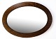 Antique oval 
mirror in dark 
stained oak 
from around the 
1910s.
Dimensions in 
cm: H:74 W:103
