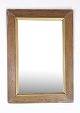 Antique mirror 
in oak wood 
with gilding 
from around the 
1920s.
Dimensions in 
cm: H:59 W:42
