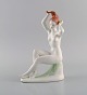 Aquincum, Budapest. Hand-painted art deco porcelain figurine. Naked woman 
combing her hair. 1940s.
