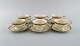 KPM, Berlin. 
Six Royal Ivory 
tea cups with 
saucers in 
cream-colored 
porcelain with 
gold ...
