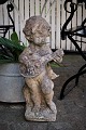 Old French 
sandstone 
figure with 
fine patina of 
little angel 
playing on 
lute. Height: 
60cm.