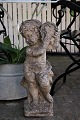 Old French 
sandstone 
figure with 
fine patina of 
little angel 
playing on 
tambourine. 
Height: 60cm.