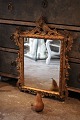 Antique French 
1800 century 
wall mirror 
with carved 
gilded wooden 
frame with fine 
decorations ...