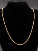 18 carat gold 
anchor necklace 
46 cm. W 0.25 
cm. weight 12.3 
grams item no. 
496752