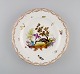 Antique and rare Meissen porcelain plate with hand-painted birds, insects and 
gold decoration. 19th century.
