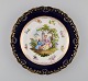 Antique Meissen 
plate in 
hand-painted 
porcelain. 
Romantic scene, 
blue border 
with gold ...