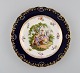 Antique Meissen 
plate in 
hand-painted 
porcelain. 
Romantic scene, 
blue border 
with gold ...