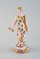 Meissen, 
Germany. Rare 
hand-painted 
porcelain 
figure. Queen 
with crown, key 
and scepter. 
Late ...