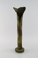 Francis Milici (b. 1952) for Vallauris. Organically shaped unique vase in glazed 
ceramics. Beautiful glaze in green and soil shades. 1980s.
