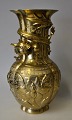 Chinese bronze vase, 20th century. Top decorated with vicious dragon. Corpus richly decorated ...