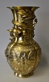 Chinese bronze 
vase, 20th 
century. Top 
decorated with 
vicious dragon. 
Corpus richly 
decorated ...