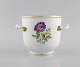 Meissen vase / 
flowerpot in 
hand-painted 
porcelain with 
flowers and 
gold edge. 
Handles modeled 
...