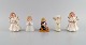 Five porcelain figurines. Angels and children. 1980s.Largest measures: 11.5 x 8 cm.In ...