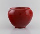 Jerome Massier (1850-1916) for Vallauris. Antique vase / flowerpot in glazed 
ceramics. Beautiful glaze in shades of red. Approx. 1900.
