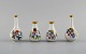 Four Herend porcelain vases with hand-painted flowers and butterflies. Mid-20th 
century.
