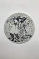 Monthly plate 
in faience for 
April - 
KONFLIKT 
(Conflict). 
Designed by 
Bjørn Wiinblad 
for ...