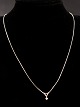 14 carat white 
gold necklace 
42.5 cm. and 
pendant 1 x 0.7 
cm. with zircon 
item no. 497834